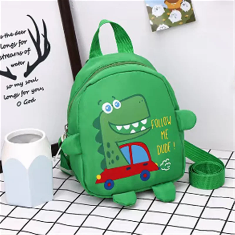 Mochila Infantil com design de dinossauro e cinto antiperda, ideal para segurança e conforto das crianças.